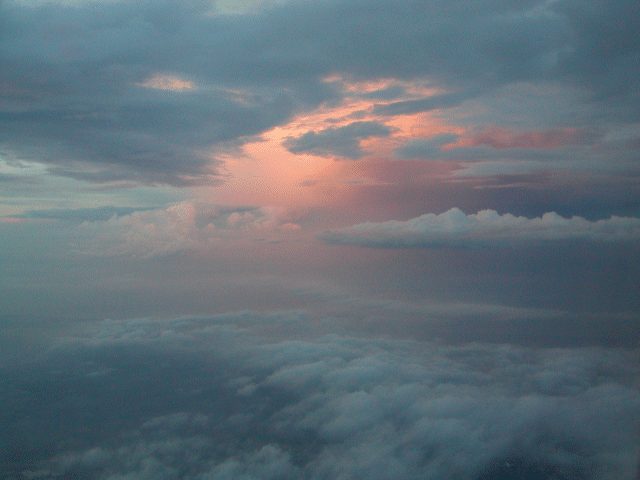 [Sundown in the clouds]